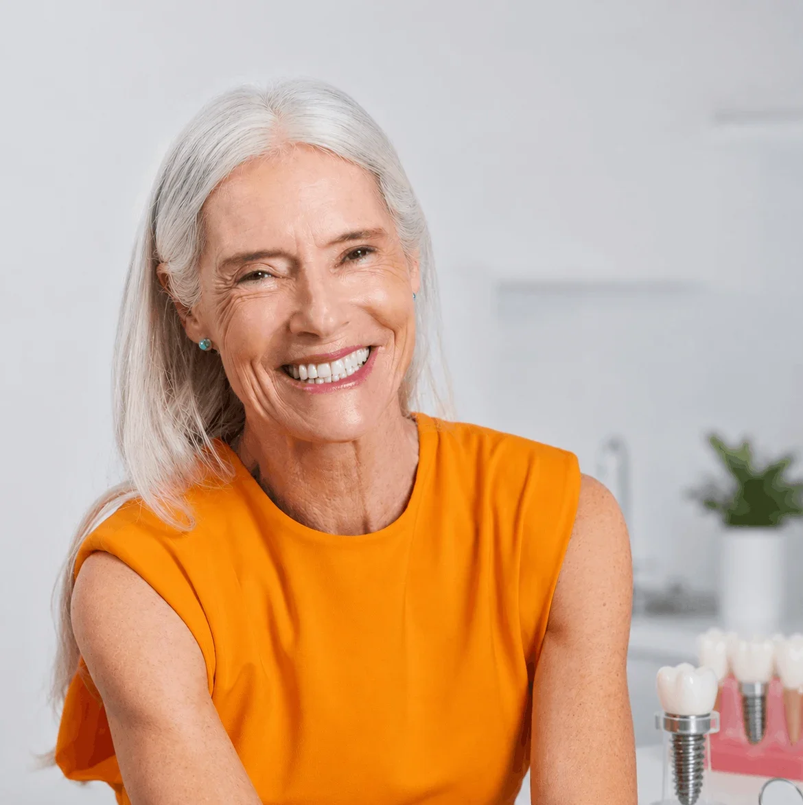 Secure, natural-looking Full-Mouth Implant smile at Dental Starz